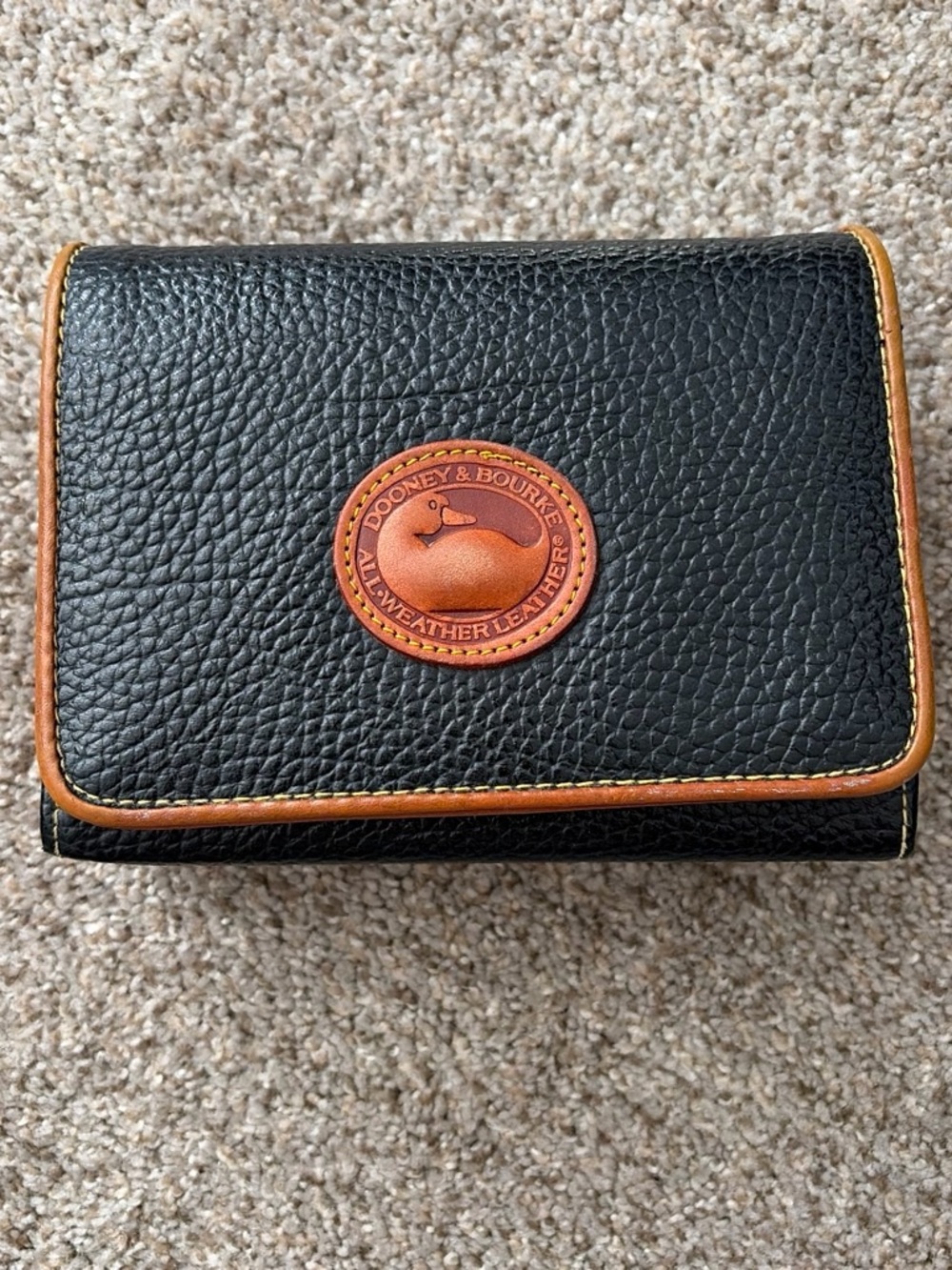 Dooney & Bourke Black Pebble Leather Wallet with Tan Trim